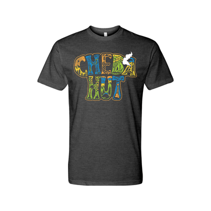 A charcoal crew-neck t-shirt is displayed on a white background. The shirt has a large graphic on the chest that reads 'CHEBA HUT' stacked in two lines. The letters have a textured, almost organic fill with various patterns and colors including yellow, orange, green, and blue. A small, stylized white graphic of smoke rises from the right side of the 'T' in 'HUT'.