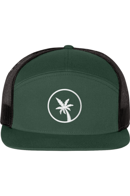 A seven -panel trucker hat with a solid green front panel and brim. The back two panels are black mesh. The front of the hat features a seven frond palm tree in white thread. The hat has a slightly curved brim and a visible button on the top.