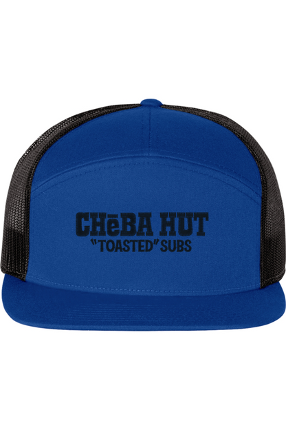 A seven-panel trucker hat with a solid blue  panel and brim. The back two panels are black mesh. The front of the hat features the black stylized text 'CHEBA HUT "TOASTED" SUBS'. The hat has a slightly curved brim and a visible button on the top.