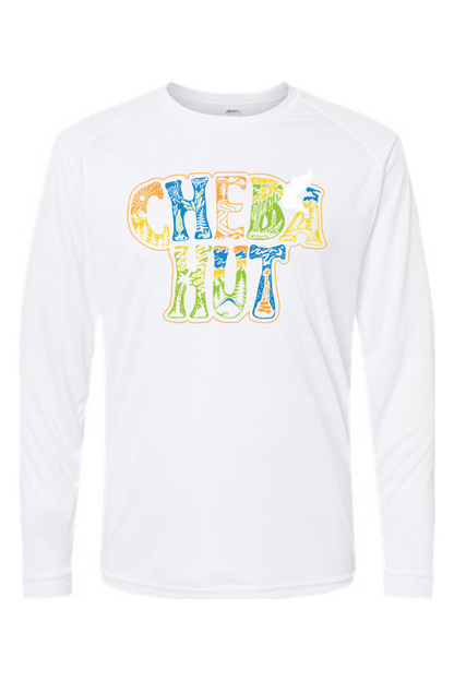 A long-sleeved white athletic shirt with the words "CHEBA HUT" emblazoned across the chest in a vibrant, multi-colored, nature-inspired font. The letters of "CHEBA HUT" are filled with illustrations of trees, mountains, and sun rays in shades of yellow, green, and blue. A small white cloud or puff of smoke is visible near the top right of the "T" in "HUT."