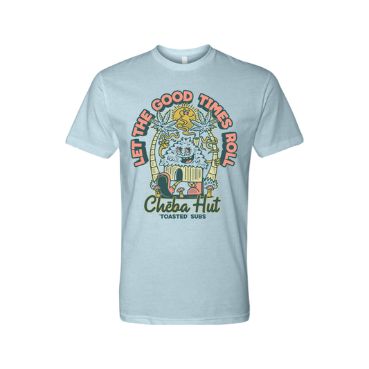 A light blue short-sleeved t-shirt featuring a cartoonish graphic with palm trees, a hut, a smiling character, marijuana leaves, and the text 'Let the Good Times Roll' and 'Cheba Hut Toasted Subs'.