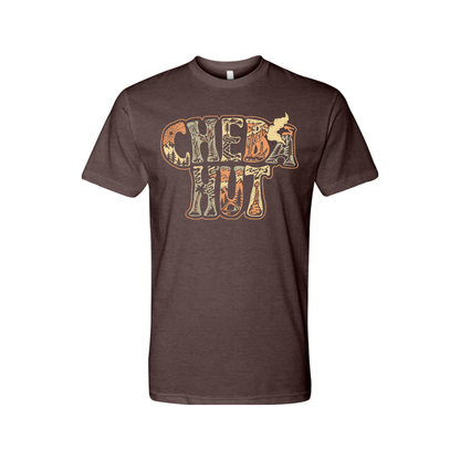 An espresso brown heathered crew-neck t-shirt is displayed on a white background. The shirt has a large graphic on the chest that reads 'CHEBA HUT' stacked in two lines. The letters have a textured, almost patterned fill in muted shades of orange, brown, and cream. Within the letters, small illustrations such as mountains, trees, and abstract shapes are subtly incorporated into the design.