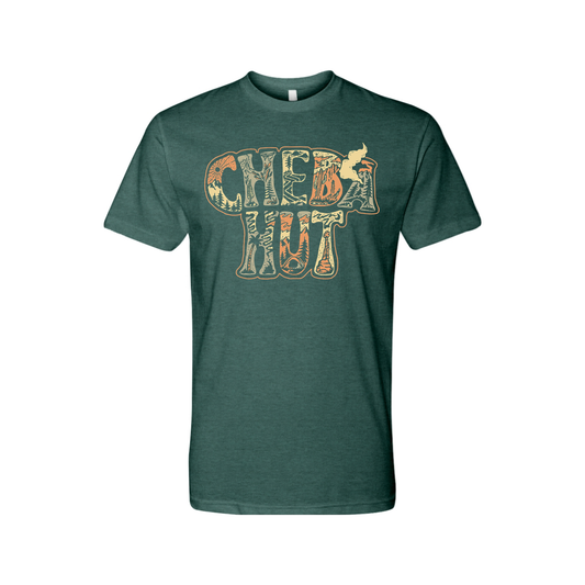A forest green heathered crew-neck t-shirt is displayed on a white background. The shirt has a large graphic on the chest that reads 'CHEBA HUT' stacked in two lines. The letters have a textured, almost patterned fill in muted shades of orange, brown, and cream. Within the letters, small illustrations such as mountains, trees, and abstract shapes are subtly incorporated into the design.