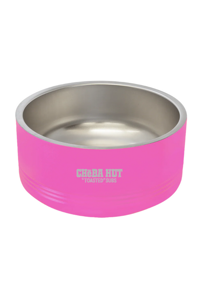 A pink and stainless steel dog bowl with the white "Cheba Hut 'Toasted' Subs" logo on the side, shown against a dark  background.