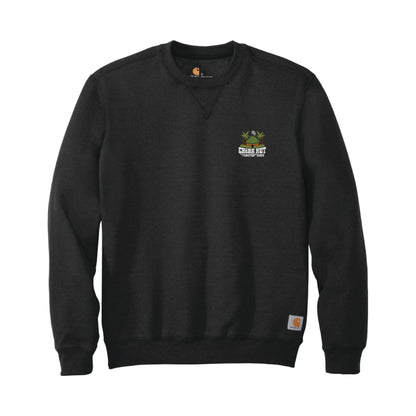 Front view of a black crewneck sweatshirt laid flat. A small, embroidered logo for "Cheba Hut Toasted Subs," featuring a tiki hut and palm trees, is on the upper left chest.
